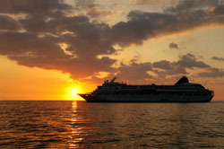 Boat at sunset, port transfers